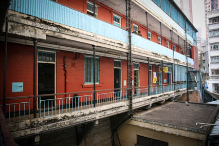 The facade of the Ablutions Block facing the Barrack Block features verandas.