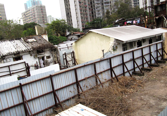 An old home being leveled by the redevelopers