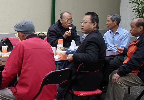 Manager of the 3rd Branch at a meeting in Ng Ancestral Hall