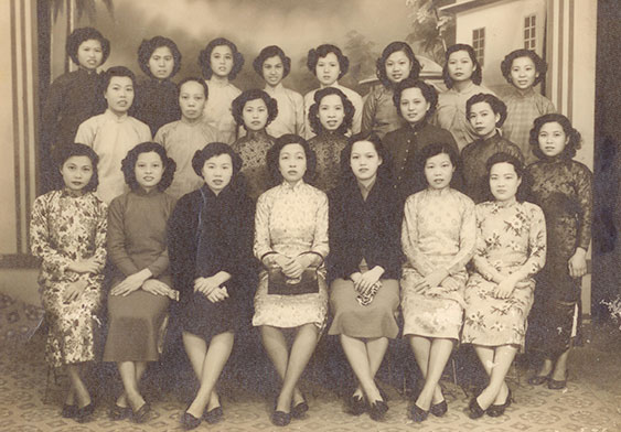 A group photo of some weaving mill workers