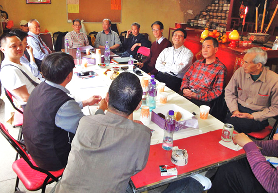 Ng Chiu Pang at a meeting of the ancestral trust