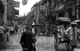 A funeral procession on Queen's Road Central