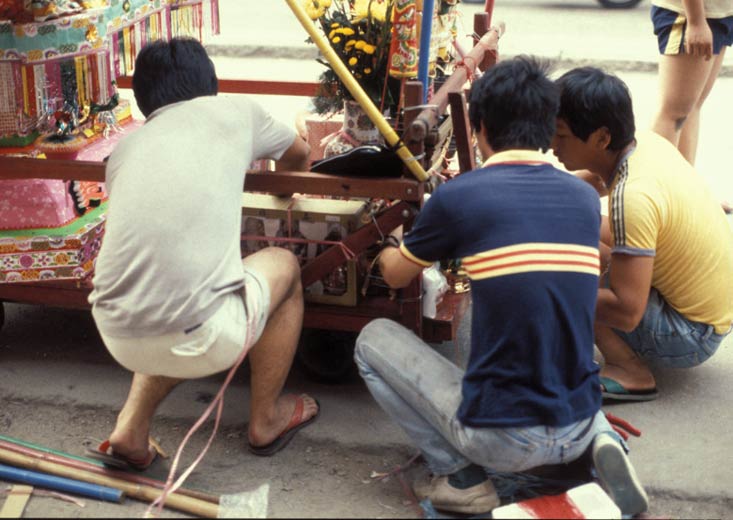Members of the Tin Hau Association work on the Flower Cannon