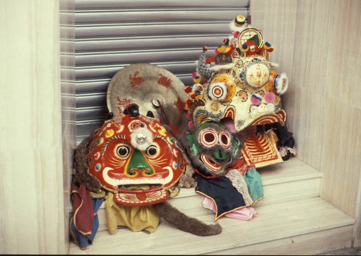 The assembled dance masks await the parade