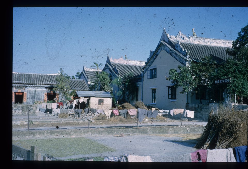 The three ornate roofs of the main ancestral hall of the Liu clan, the Man Shek Tong.
